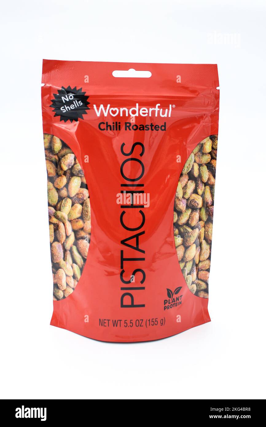 A bag of Wonderful pistachios chili roasted  flavor on an isolated background. Stock Photo