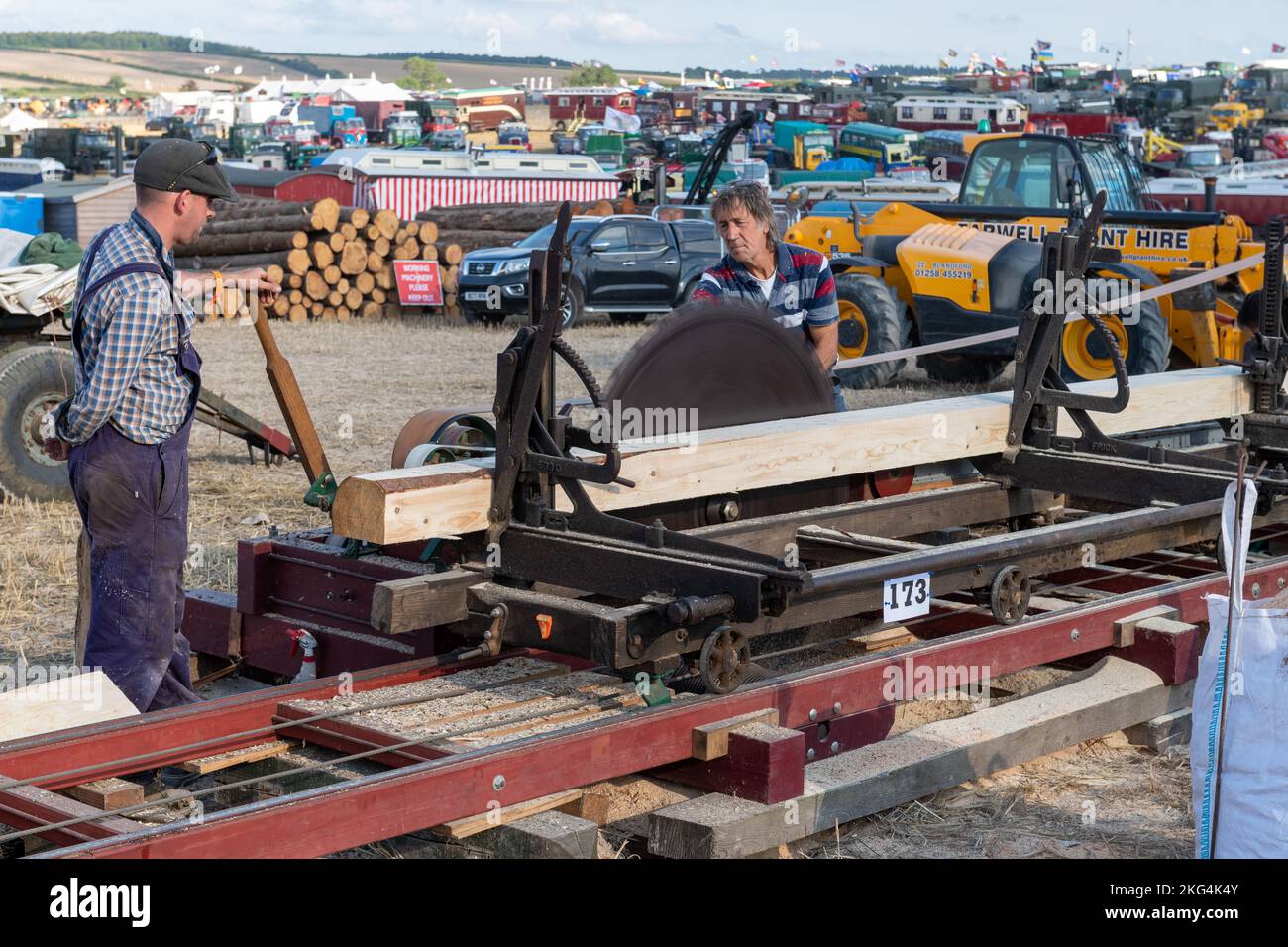 Tarrant Hinton.Dorset.United Kingdom.August 25th 2022.Enthusiasts are cutting timber using an old fashioned saw bench at the Great Dorset Steam Fair Stock Photo