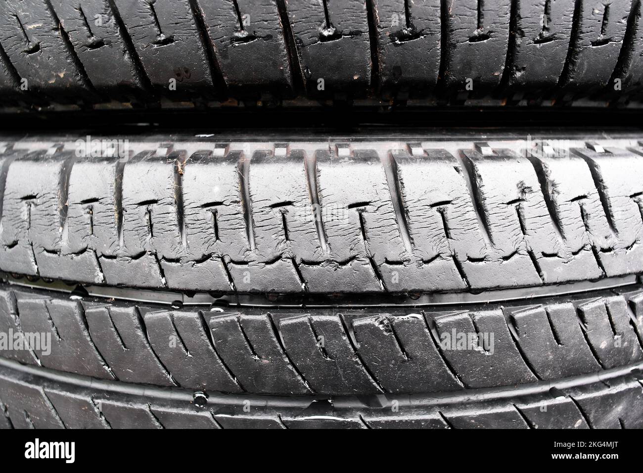 Cracked old tire texture, auto tyre garbage and pollution concept Stock