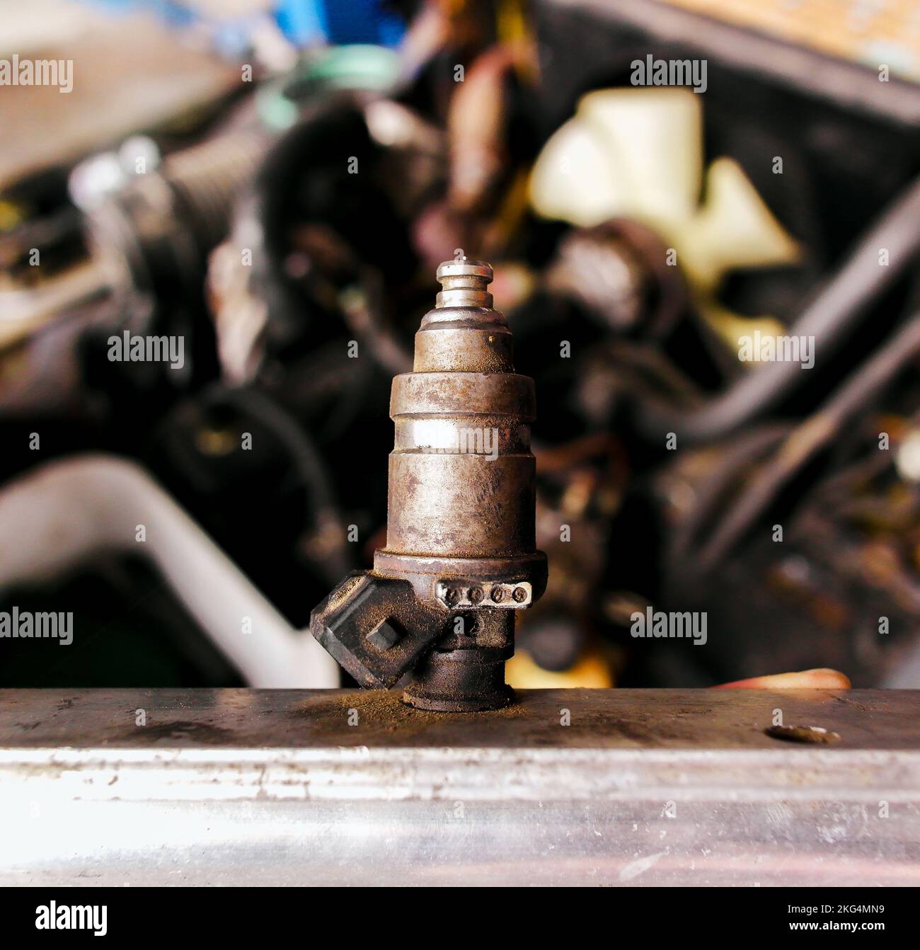 Close up of old broken gas injectors of the LPG gas fuel system of a