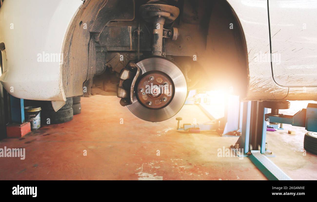 Disc brakes and calipers that remove the wheels of a car in the auto