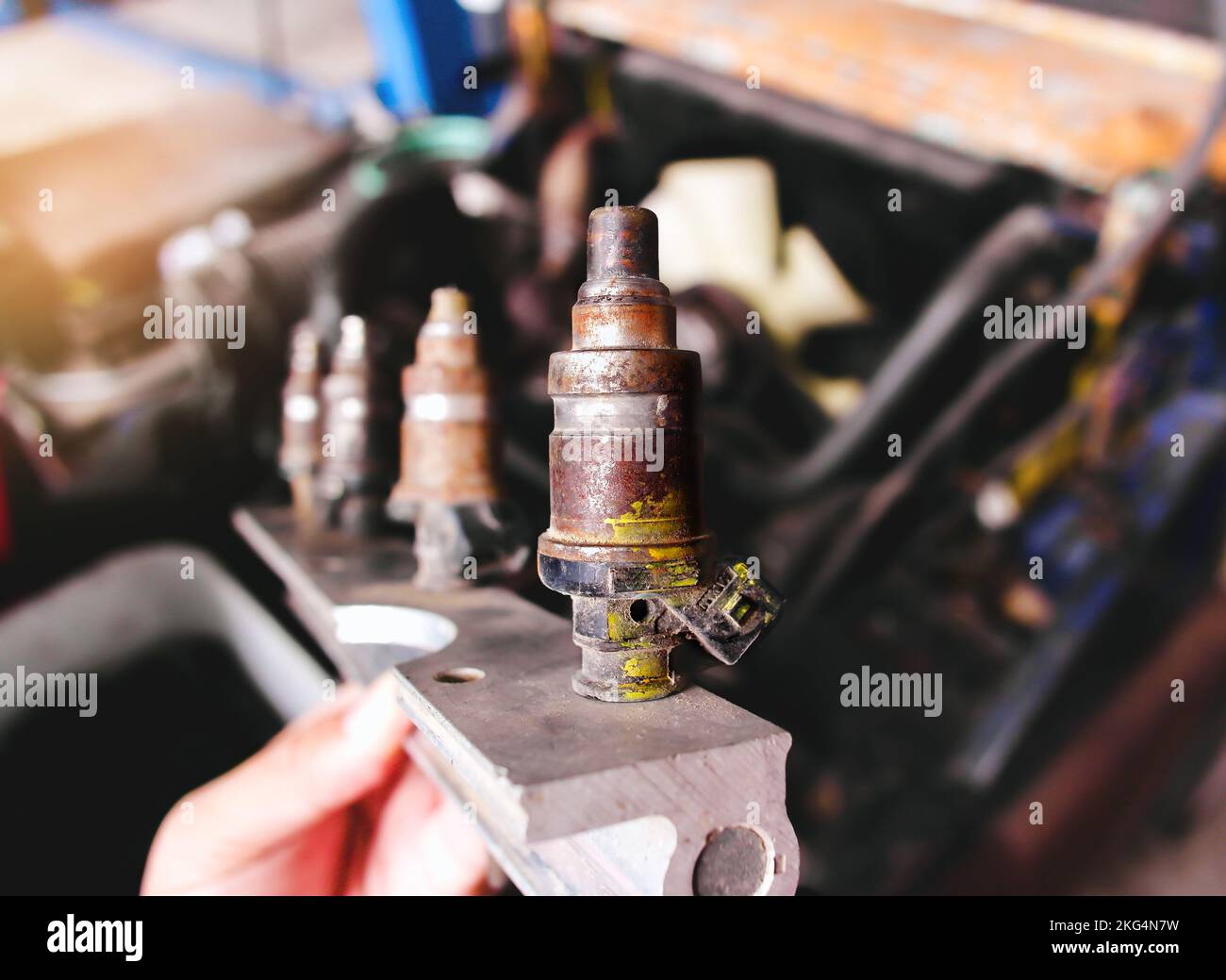 Close up of old broken gas injectors of the LPG gas fuel system of a