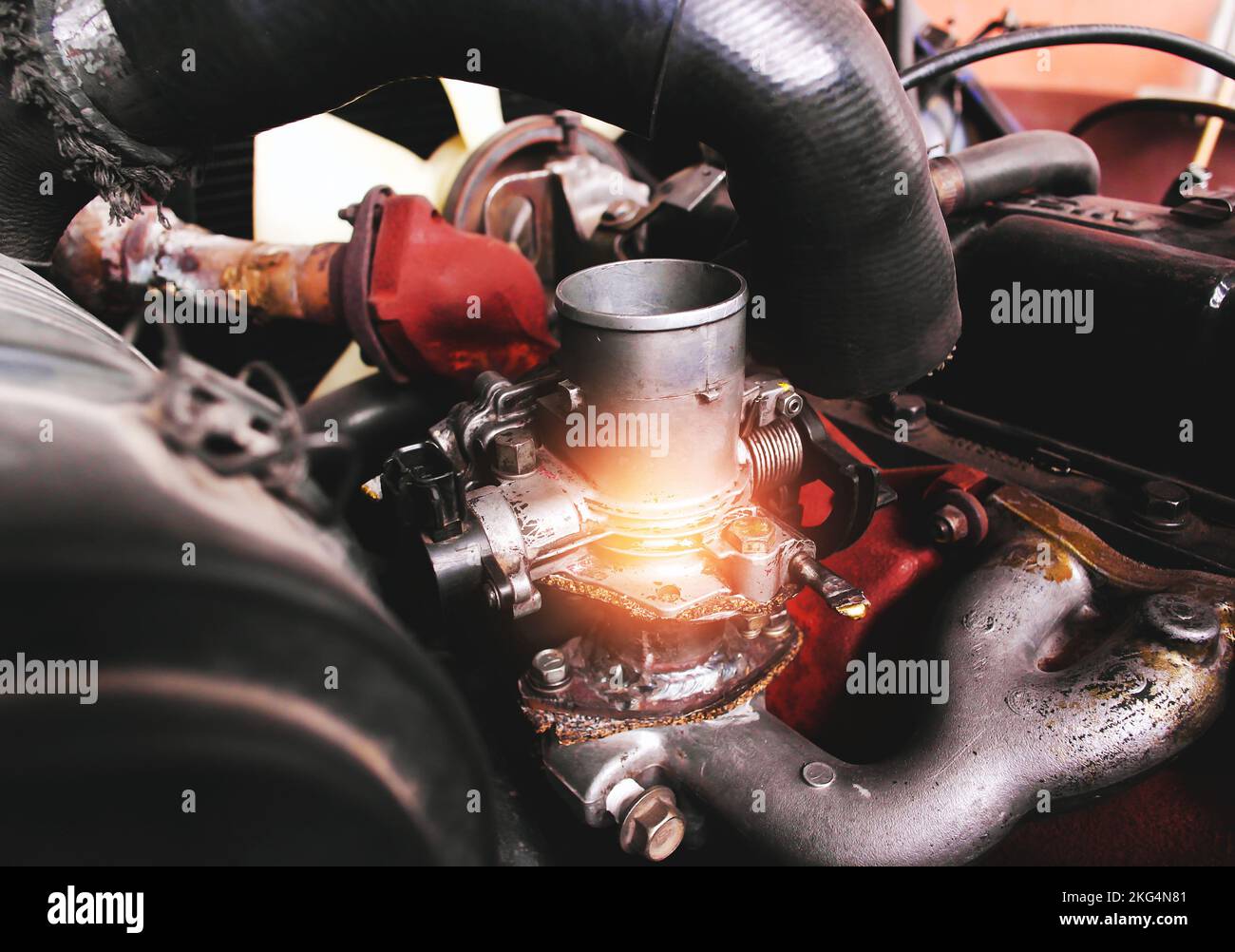 Throttle valve is hot in the engine compartment of the car Stock Photo