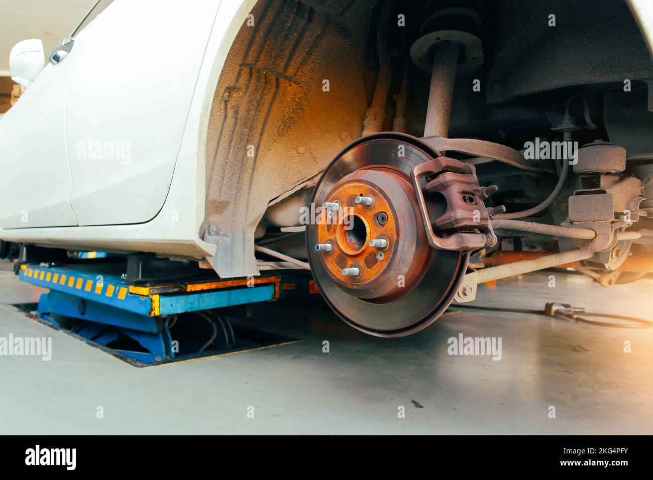 Rear disc brakes and calipers that remove the wheels of a car in the