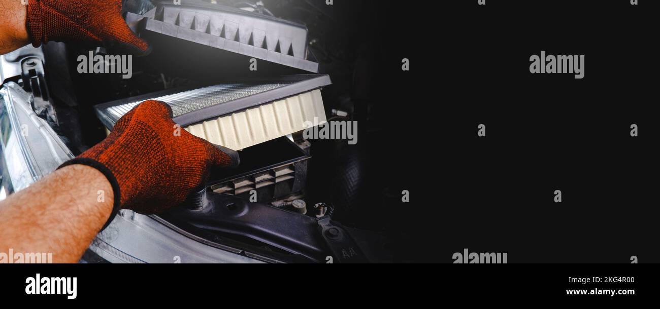 Car air filter being inserted into air filter box in the automobile