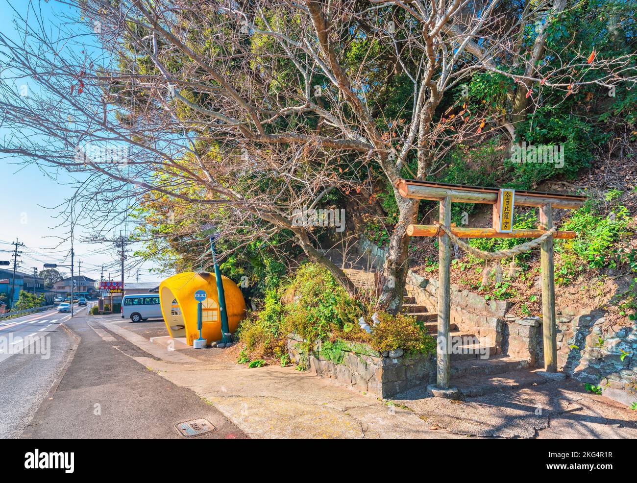 kyushu, japan - dec 10 2021: Kofukai bus stop designed like a Japanese mikan along the Tokimeki Fruit-shaped Avenue aside the torii gate of the Kotohi Stock Photo