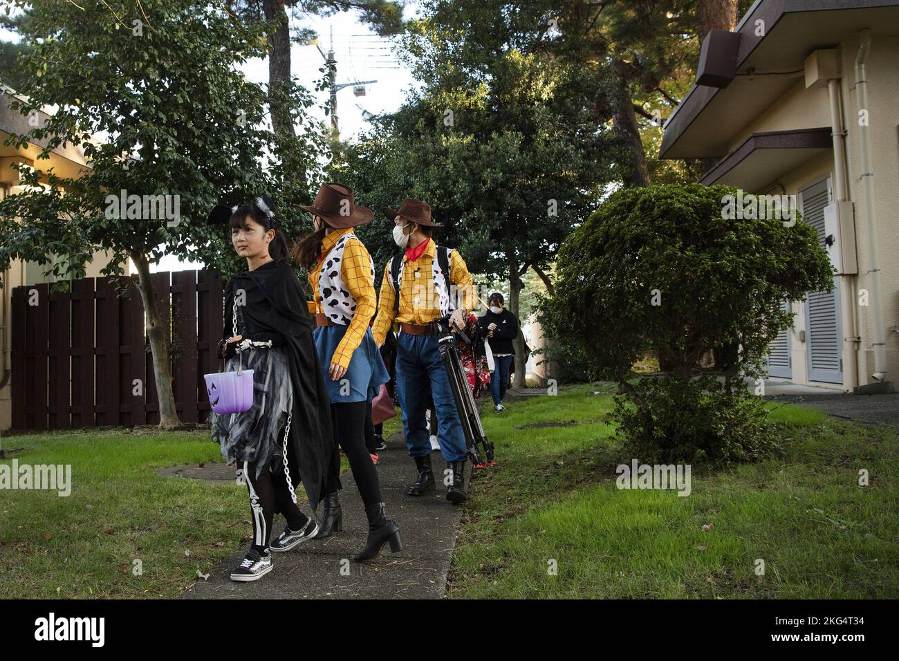 Saaya Kobayashi, trickortreater, leads members of the Japanese
