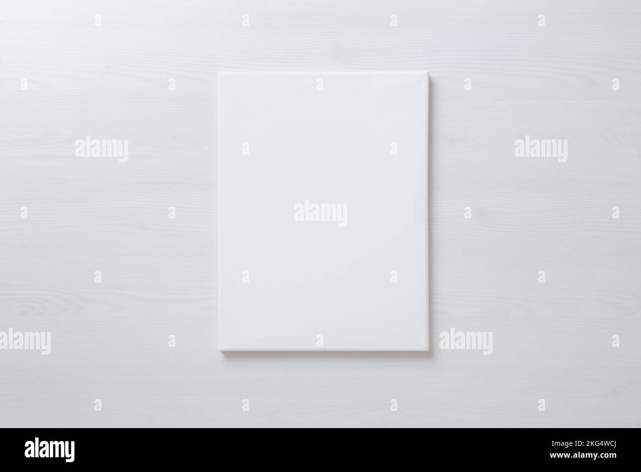 Vertical blank art canvas frame mockup for arts painting and photo presentation mockup. Laid on the floor Stock Photo