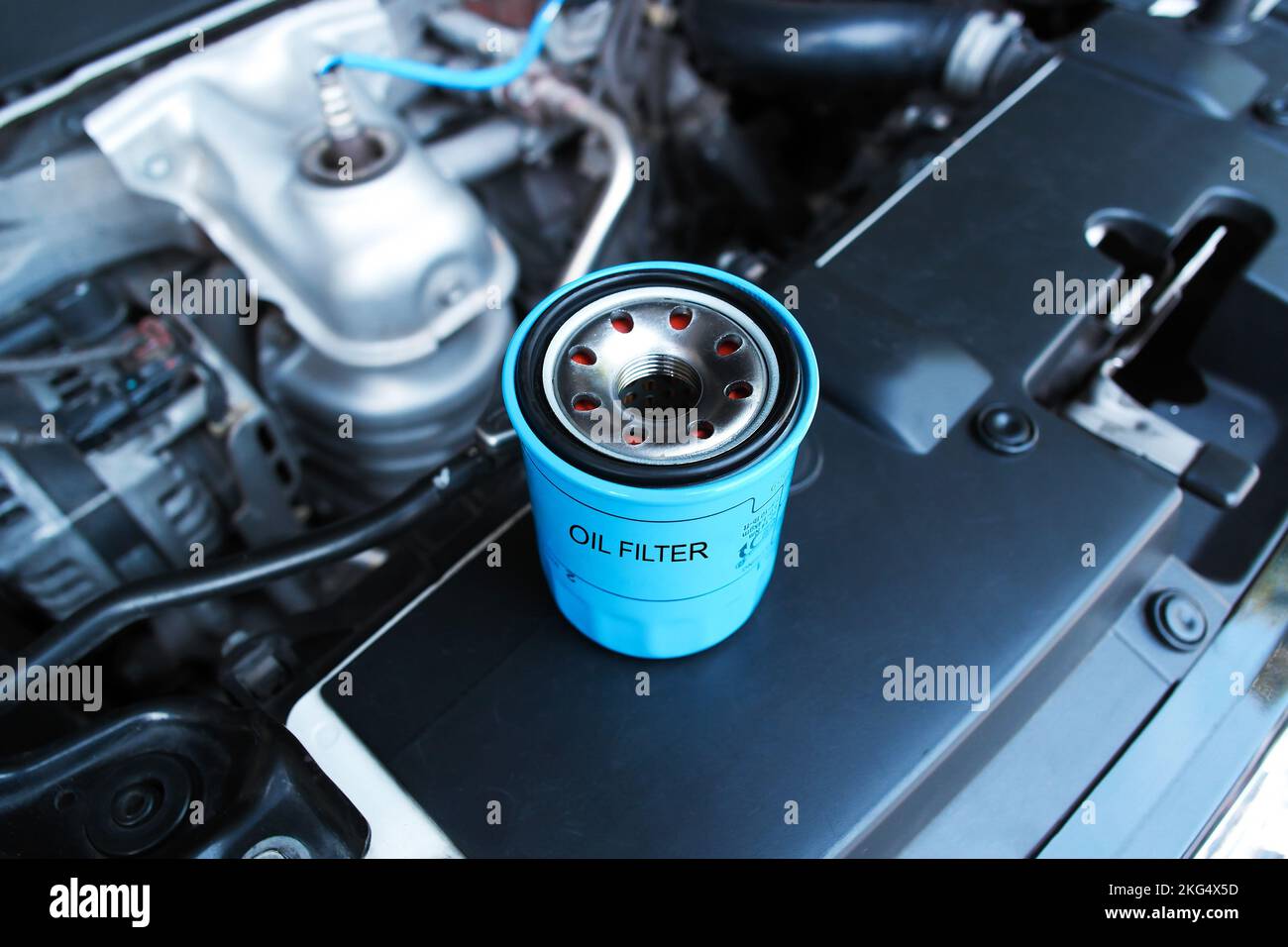 Automotive motor oil filter in the engine compartment, auto maintenance