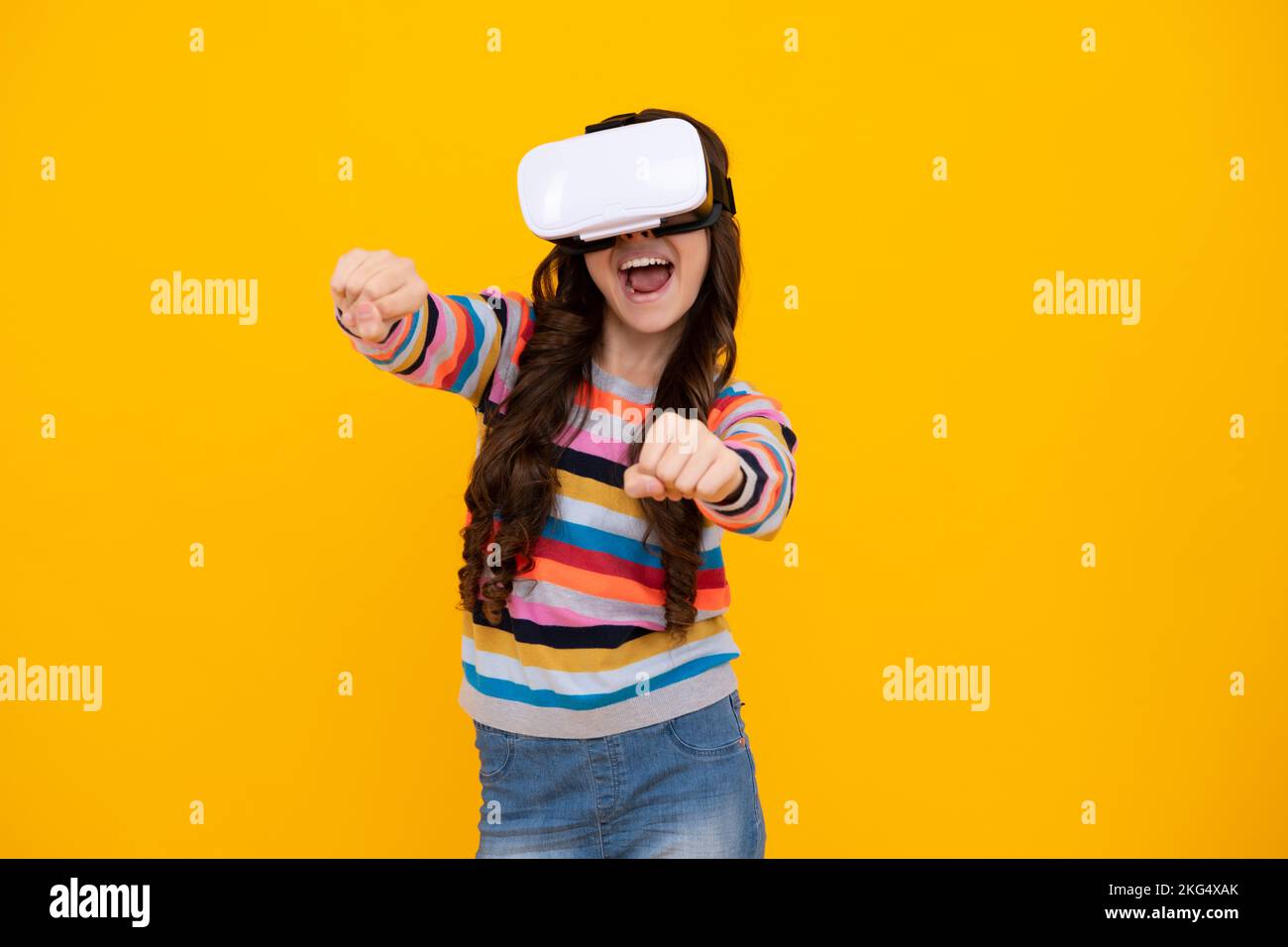 Amazed teenager. Portrait of young teen girl in VR helmet, isolated on