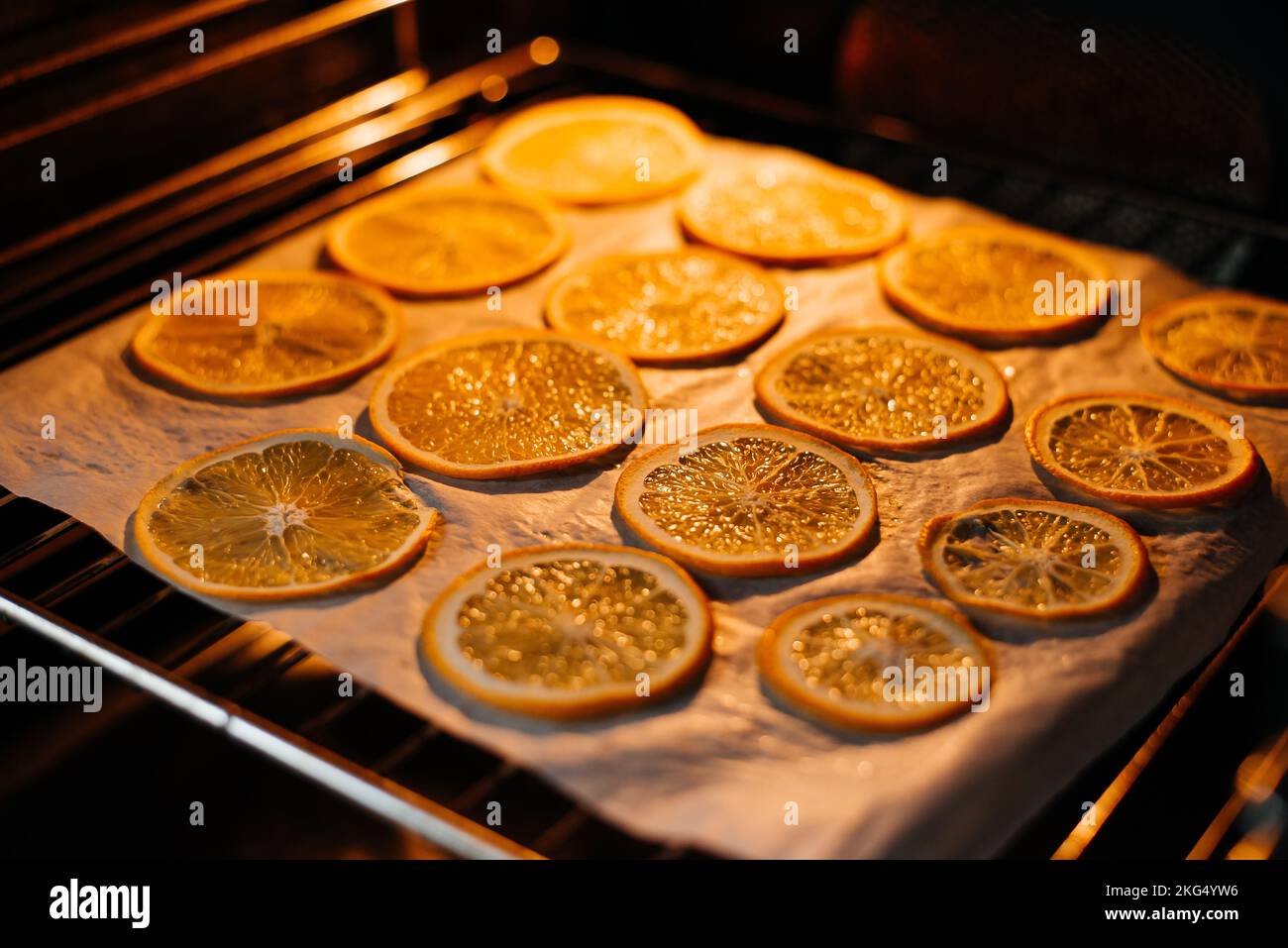 Dried orange in the oven. Orange is dried in the oven Stock Photo - Alamy
