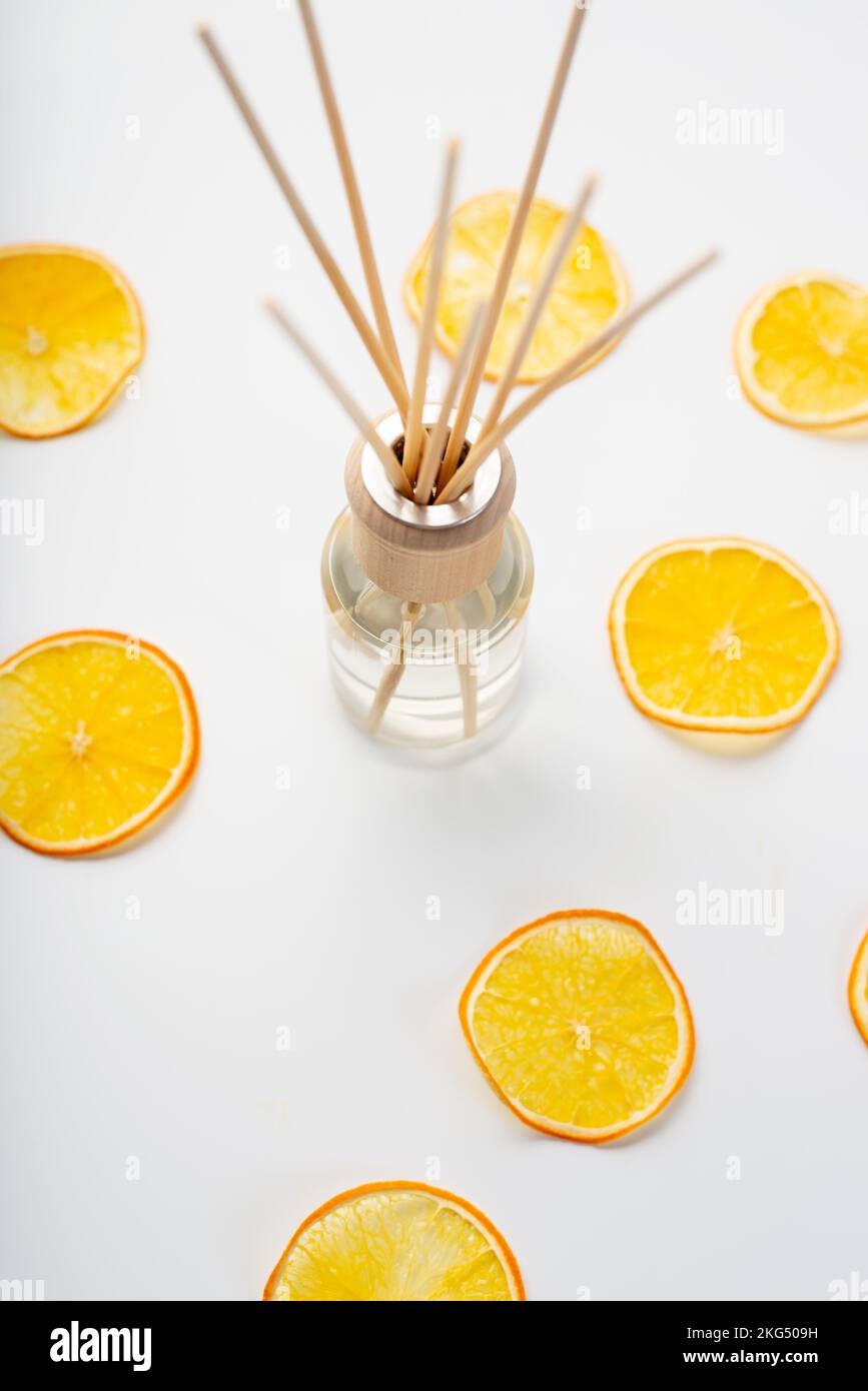 Aroma sticks in glass bottle. Wooden aroma sticks in a glass flask ...