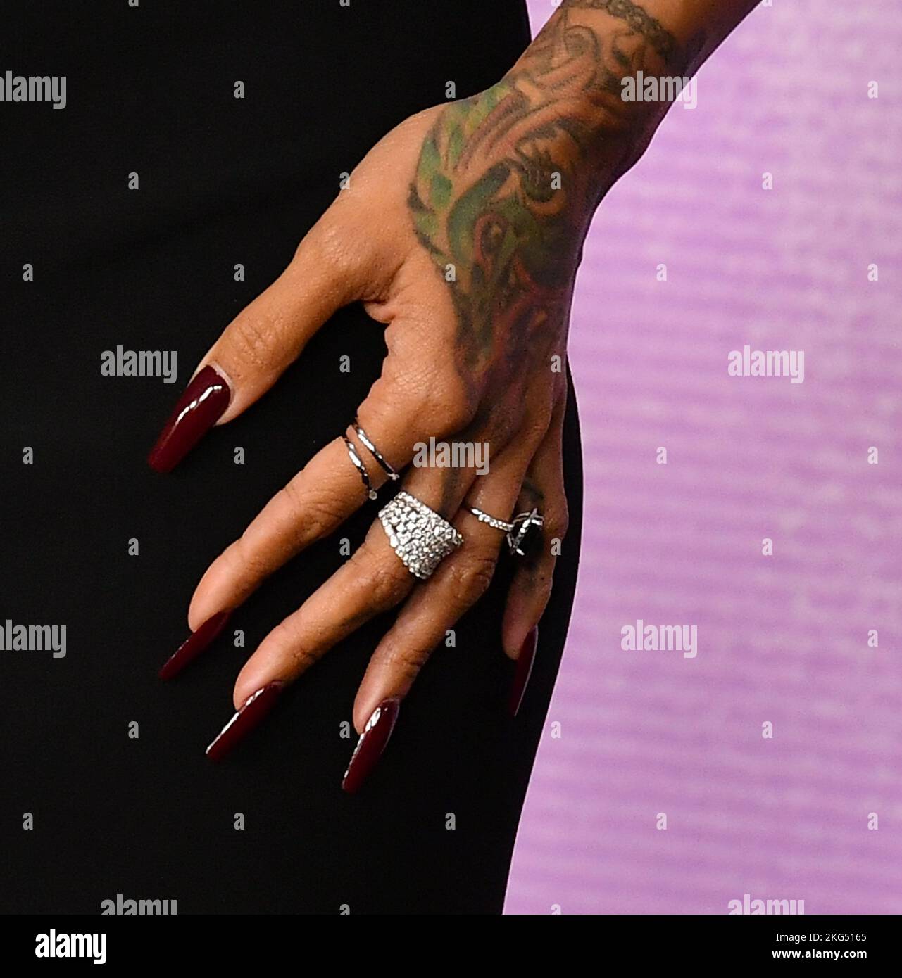 Karrueche Tran, Jewelry detail attends the 2022 American Music Awards at Microsoft Theater on