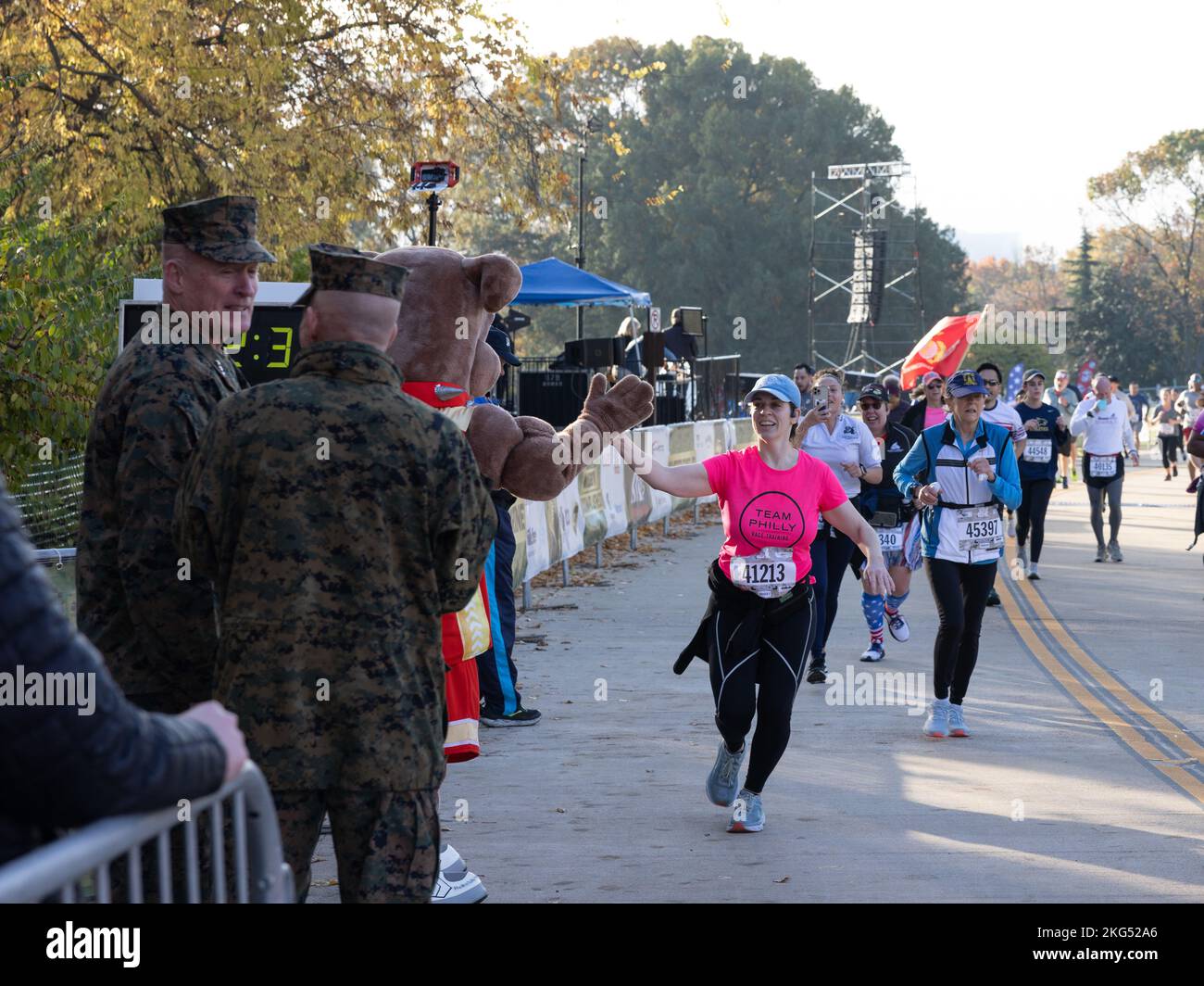 Florence McAvoy, a native of Alexandria, Virginia, high fives Miles