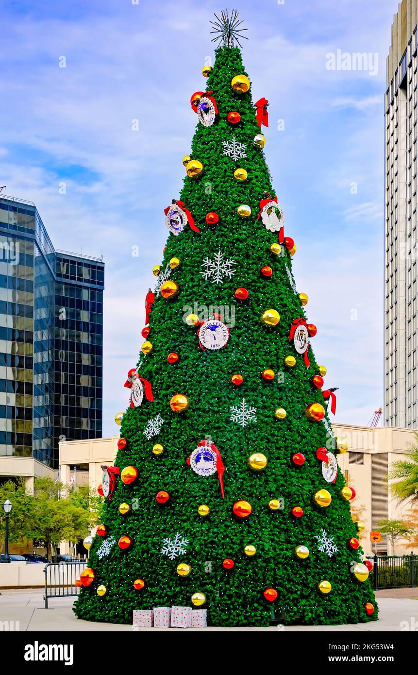 Mardi Gras Christmas tree decorated with purple (justice), green (faith),  gold (power) ornaments in the Mobile, Alabama Regional Airport Stock Photo  - Alamy