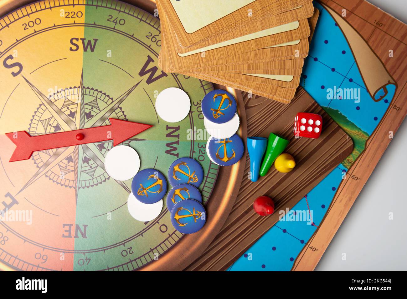 Board game. Cubes with numbers and cards for the game. Evening pastime. Stock Photo