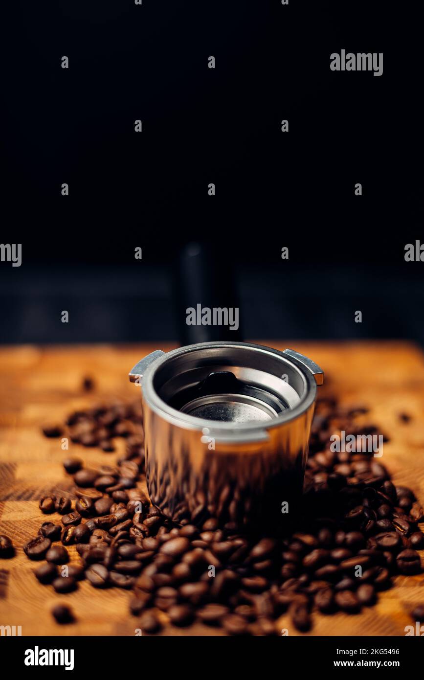 Empty portafilter the background of coffee beans Stock Photo Alamy