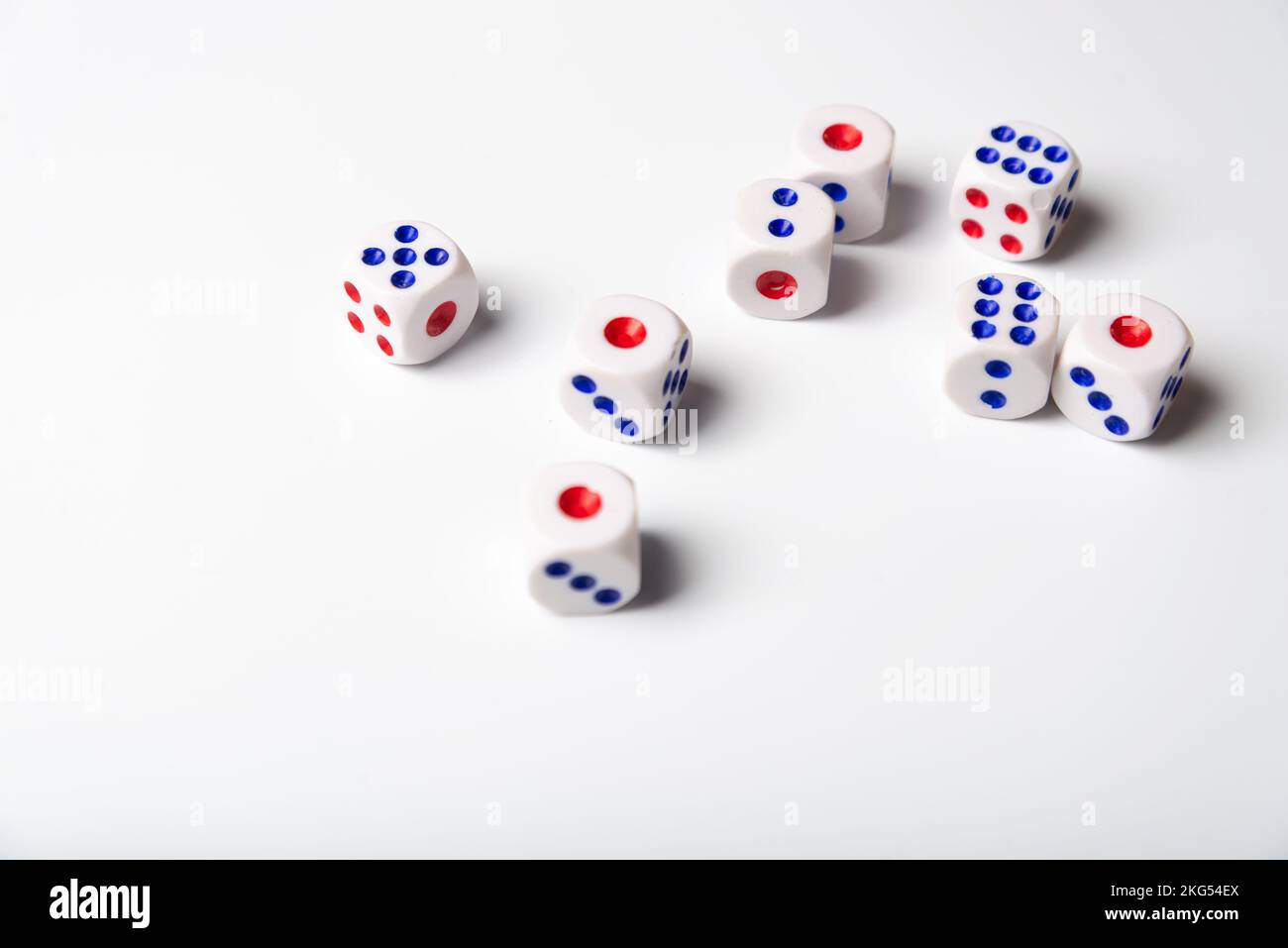 Dice with numbers on a white background. Accident Stock Photo