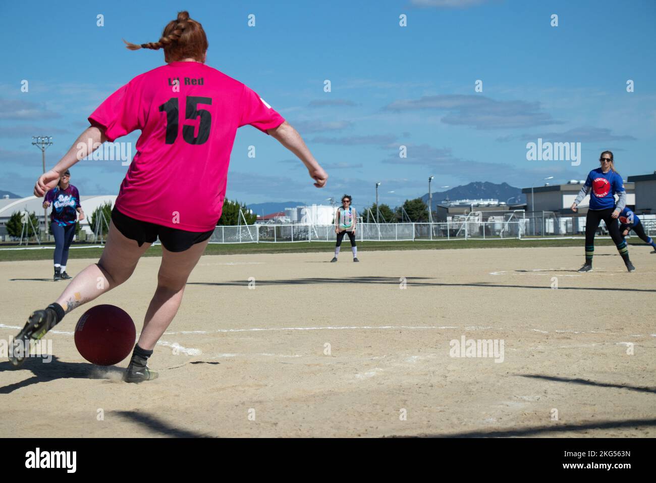 A Spouses Iwakuni Area Kickball Association (SIAKA) member prepares to kick a ball at an all