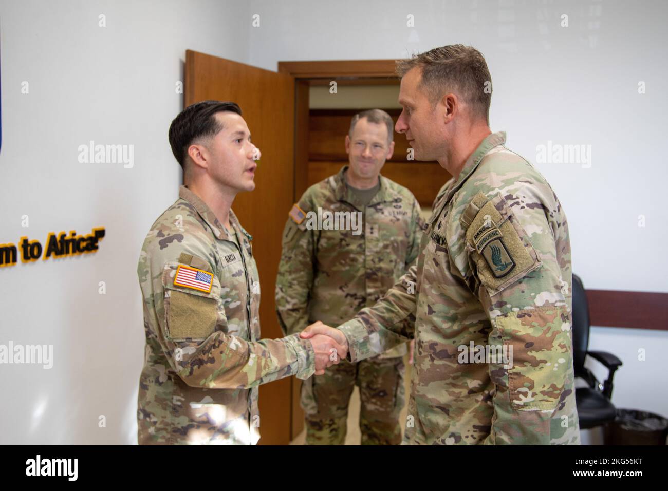 Col. Michael F. Kloepper, 173rd Airborne Brigade commander, presents Sgt. Eric Garcia the Army Commendation Medal during the Commander's Ready and Resilient Council Warrior Recognition ceremony on Caserma Ederle, Vicenza, Italy, Oct 31, 2022. Garcia was chosen by his command to be recognized for his efforts with the 173rd sponsorship program. ( U.S. Army photo by Spc. Semaj Johnson) Stock Photo