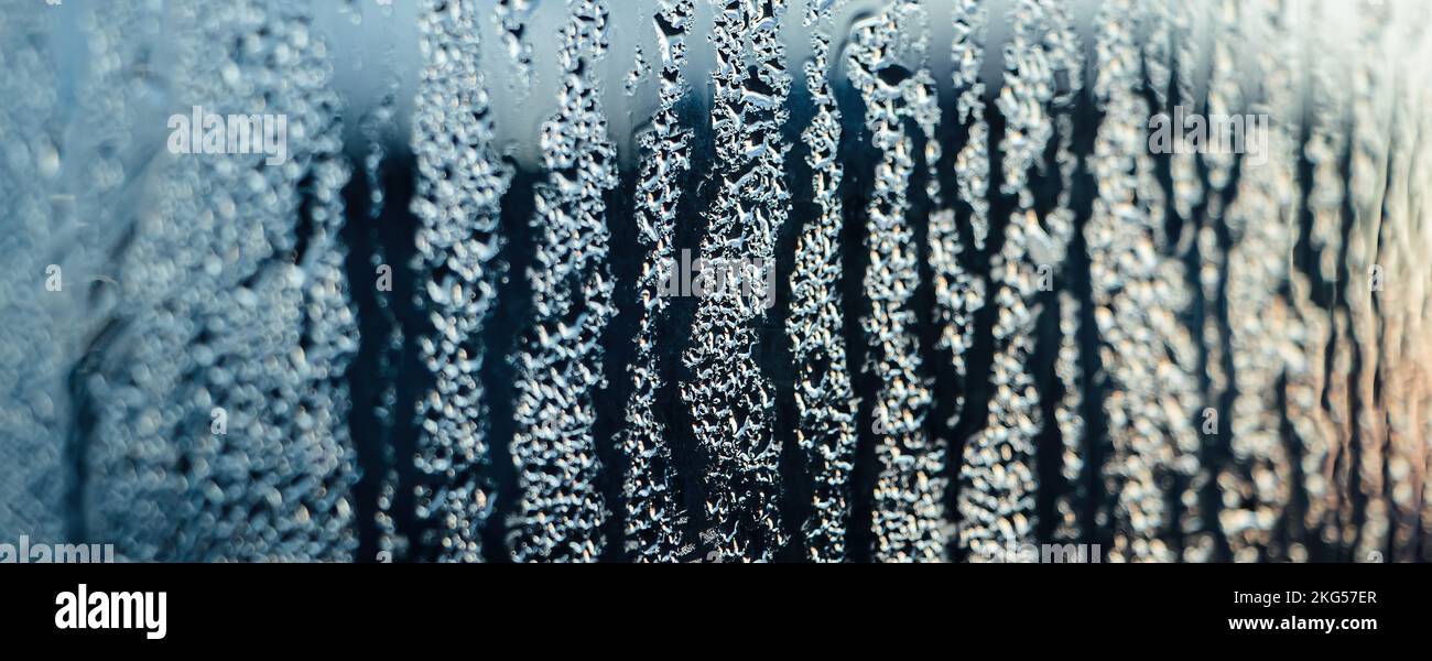 Texture of misted glass in winter. Frozen drops of water in sun on ...