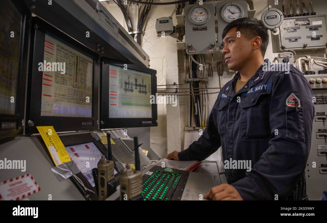NORTH SEA (Oct. 31, 2022) Gas Turbine Systems Technician (Mechanical) 3rd Reynante Imperial stands watch in the engine room aboard the Arleigh Burke-class guided-missile destroyer USS Roosevelt (DDG 80), Oct. 31, 2022. Roosevelt is on a scheduled deployment in the U.S. Naval Forces Europe area of operations, employed by U.S. Sixth Fleet to defend U.S., allied and partner interests. Stock Photo
