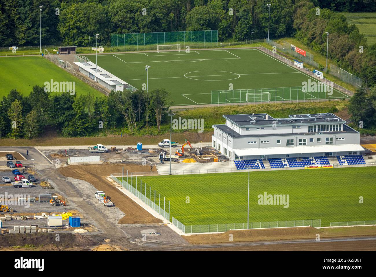 Aerial view, construction site and new construction sports field with stands and a club building with sports day care center, An der Lohschule, Rhyner Stock Photo
