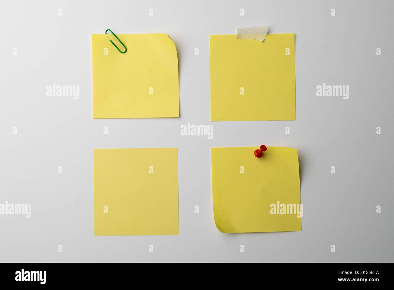 Yellow sticky memo notes with copy space on white background Stock Photo
