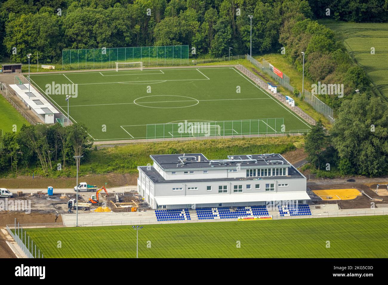 Aerial view, construction site and new construction sports field with stands and a club building with sports day care center, An der Lohschule, Rhyner Stock Photo