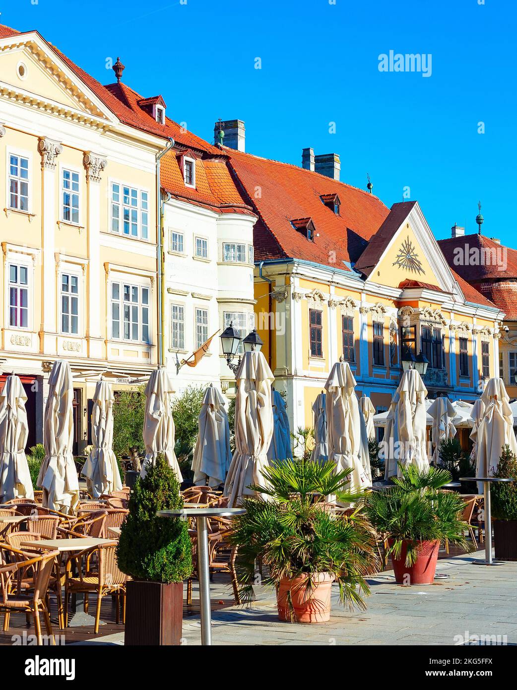 Outdoor terrace of restaurant on touristic street, Gyor, Hungary Stock Photo