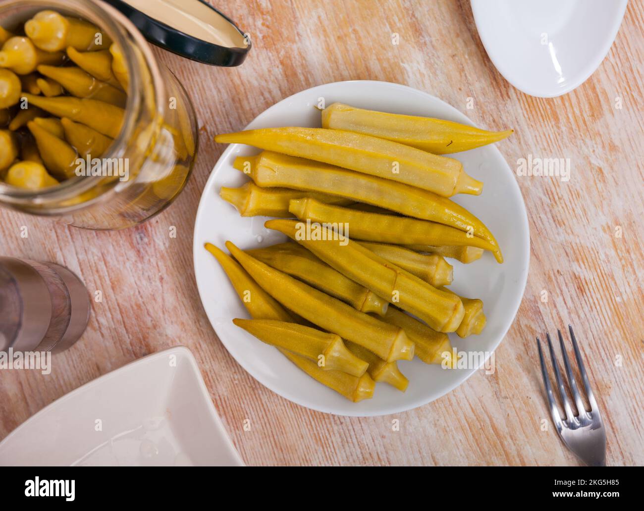 Homemade organic marinated pickled okra Stock Photo Alamy