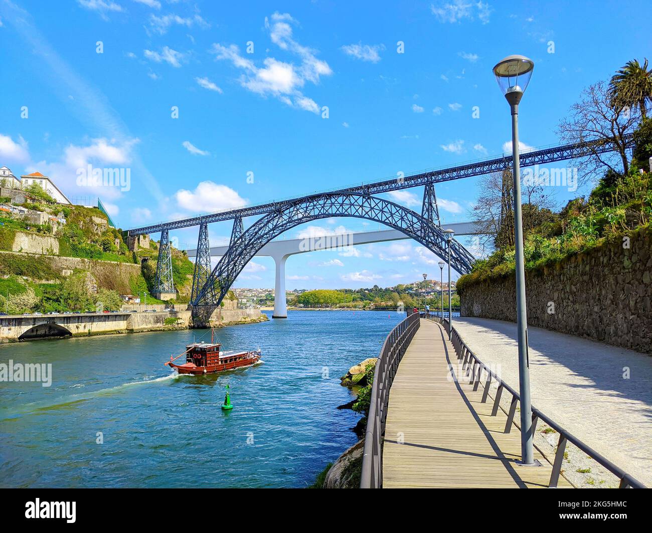 Douro river with traditional sailing wine boat cruise, view of Maria