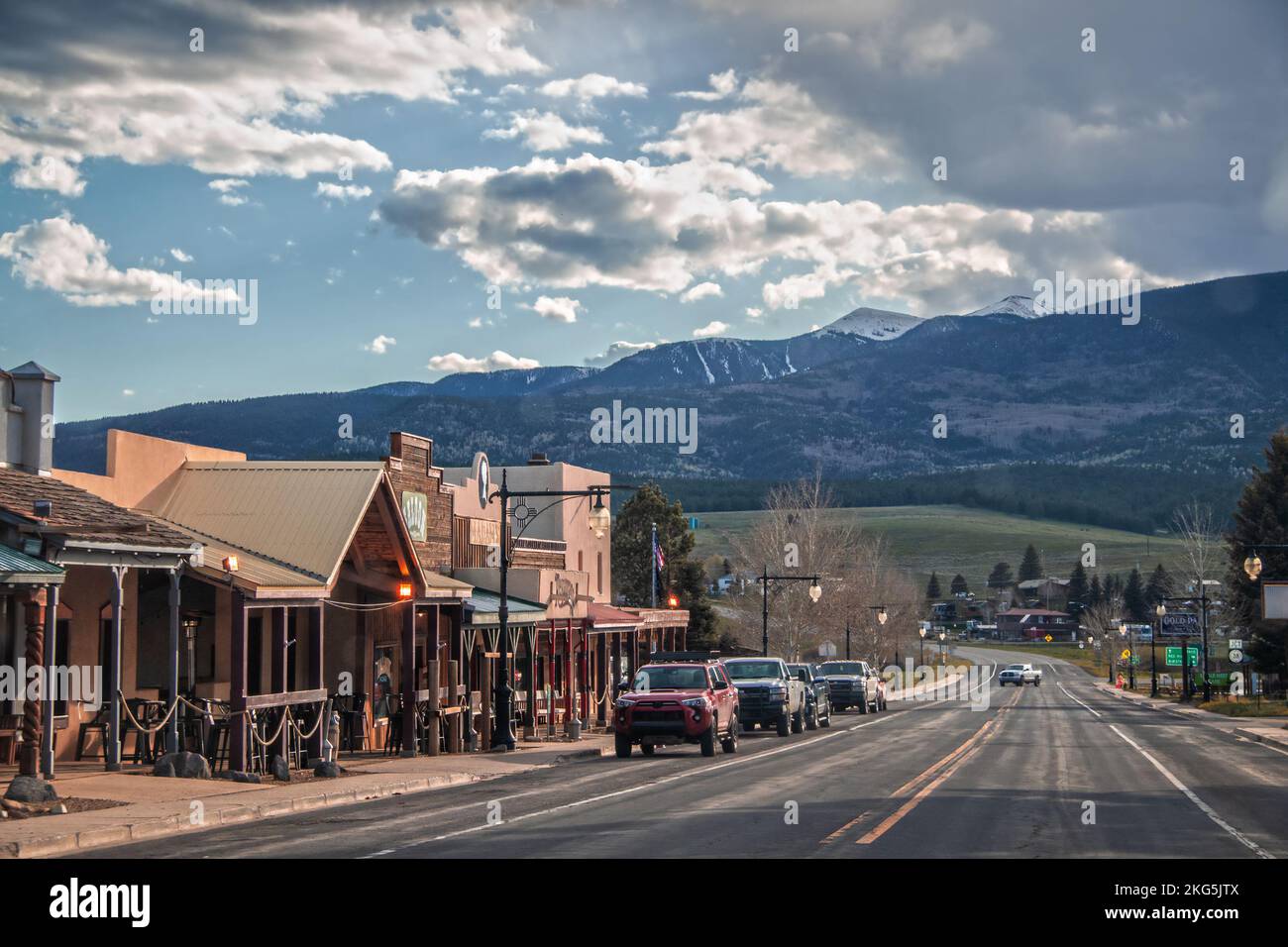 2021 05 20 Red River New Mexico USA- Small western style tourist town near Angel Fire ski resort in New Mexico with cars parked on main drag through t Stock Photo