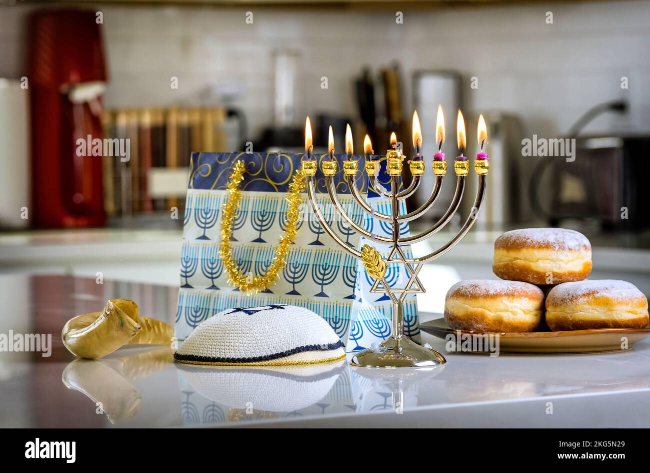 Hanukkiah menorah candles lighting Judaism tradition holiday symbols for Hanukkah celebration