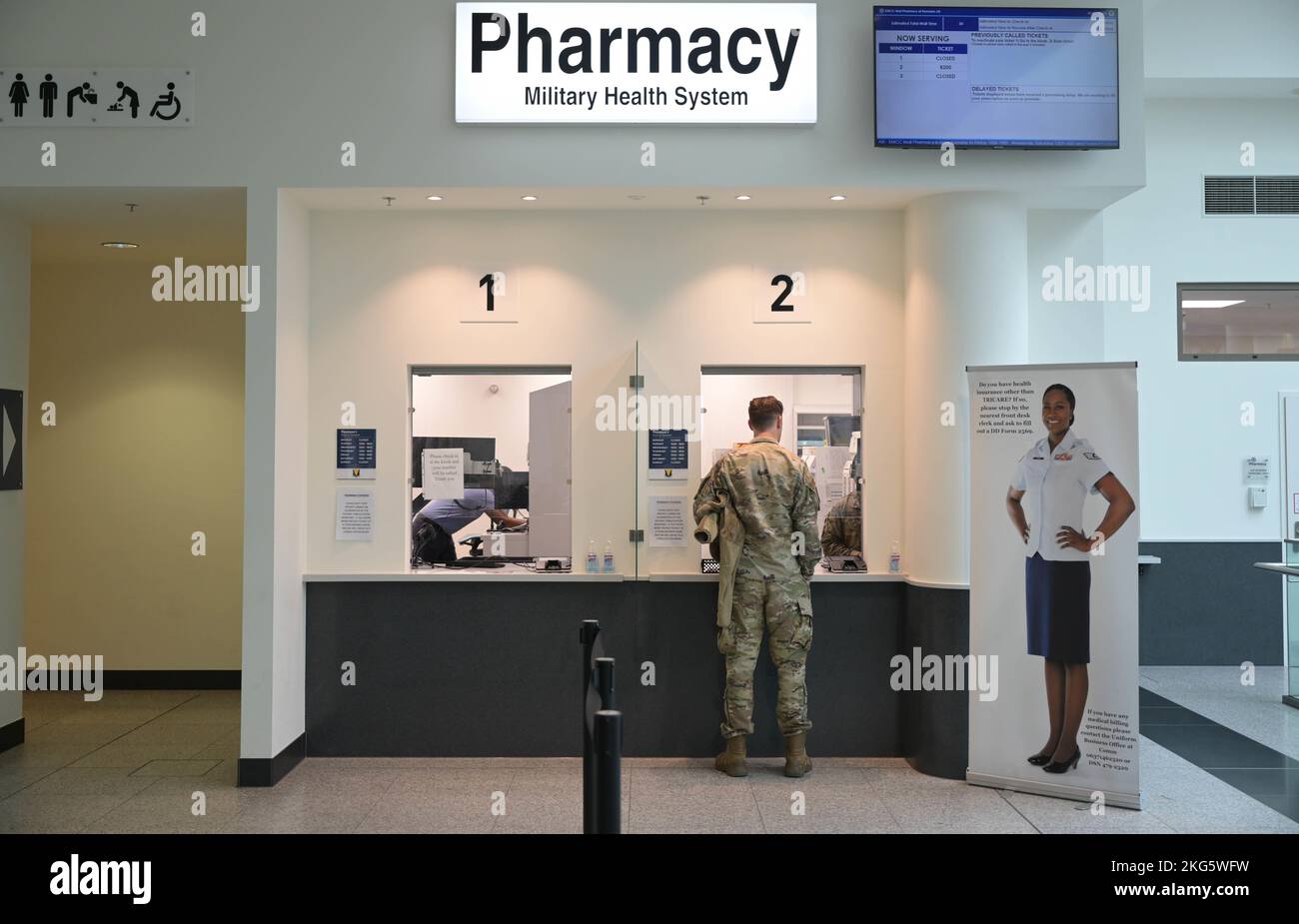 A patient is serviced at the KMCC Satellite Pharmacy at Ramstein Air Base, Germany, Oct. 4, 2022. Modernizations to storage, automation systems, and processes has increased the speed and quality of service at the satellite pharmacy. Stock Photo