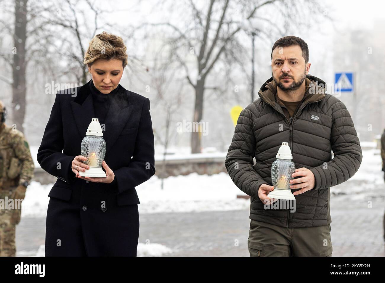Ukraine President Volodymyr Zelensky and First Lady Olena Zelenska honored the memory of the fallen participants of the Revolution of Dignity. On the Day of Dignity and Freedom, President of Ukraine Volodymyr Zelenskyy together with his wife Olena honored the memory of the activists perished during the Revolution of Dignity.  The presidential couple placed icon lamps near the cross on the Alley of Heroes of the Heavenly Hundred in Kyiv. Stock Photo