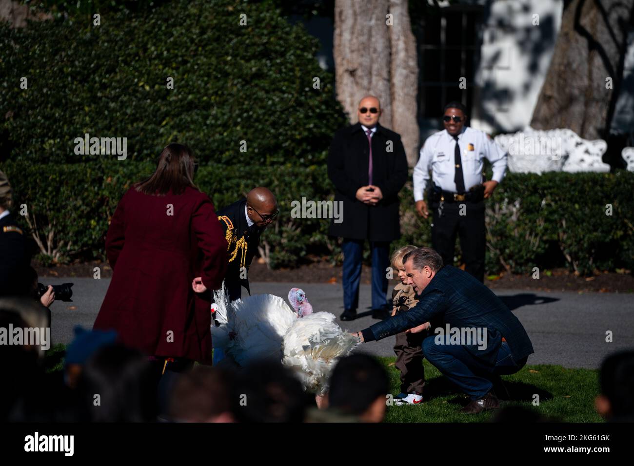 Washington, United States. 21st Nov, 2022. Hunter Biden and his son, Beau, greet the turkeys before the Turkey Pardon. President Biden partook in the annual tradition of pardoning a turkey on the South Lawn of the White House. In addition to telling many dad jokes, Biden spoke on the importance of Thanksgiving and the importance of being able to gather as a family. (Photo by Jordan Tovin/SOPA Images/Sipa USA) Credit: Sipa USA/Alamy Live News Stock Photo