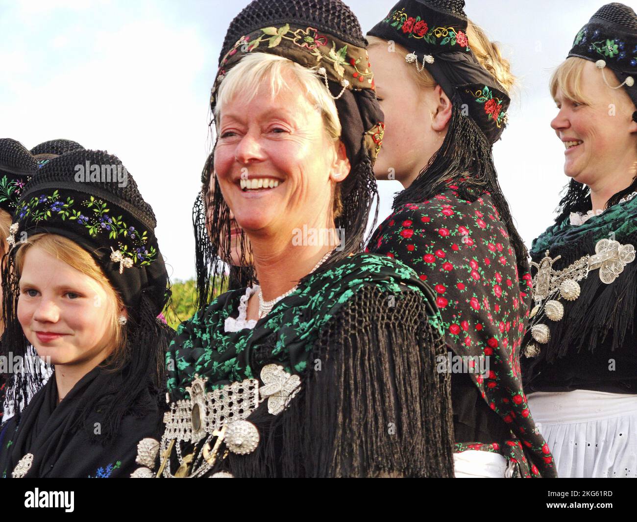 Women and girl in frisian costume, Close-up, faces, at midsummer festival on Amrum, North Frisian islands, Germany Stock Photo