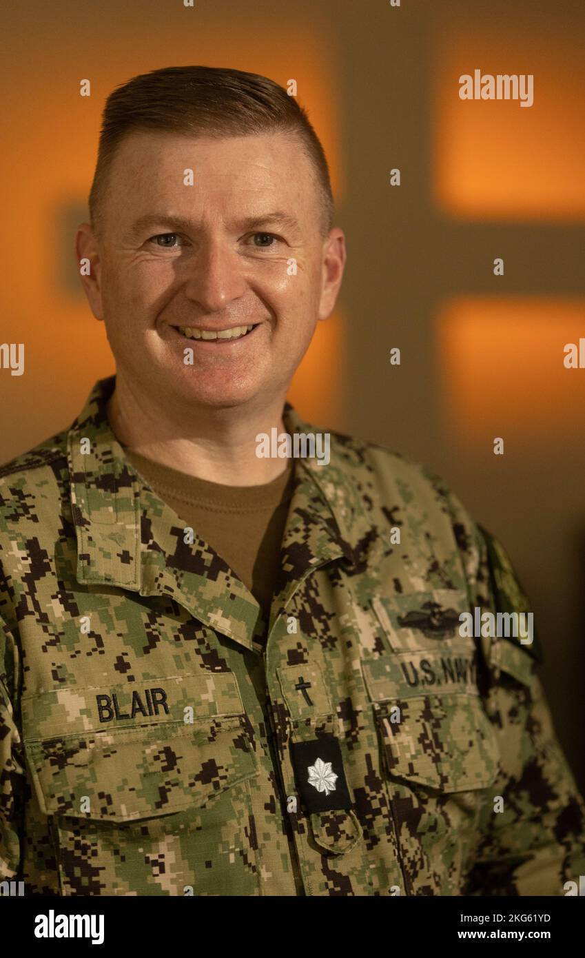 Cmdr. Joseph Blair, from Chattanooga, Tennessee, a chaplain at Walter Reed National Military Medical Center (WRNMMC), poses for a photo in the chapel at Walter Reed National Military Medical Center in Bethesda, Maryland, Oct. 6, 2022. WRNMMCs clergy were being celebrated in honor of Clergy Appreciation Day. Clergy Appreciation Day is a National holiday to recognize the work of ministers, pastors, and priests. Stock Photo