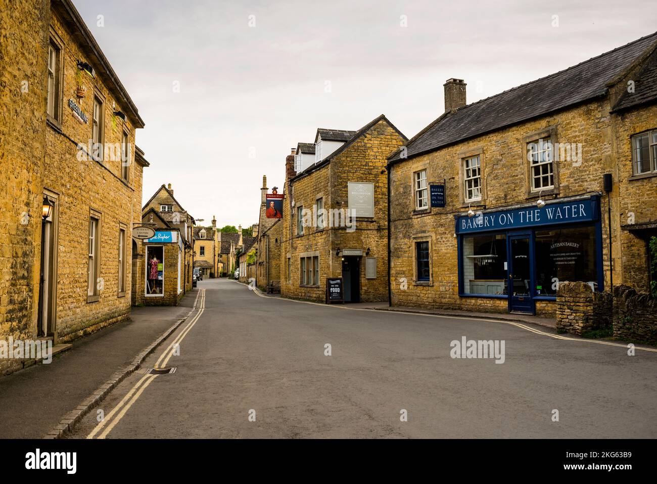 Bourton-in-the-Water, the Cotswolds, England. Notice the tiny Gothic pointed arch window. Stock Photo