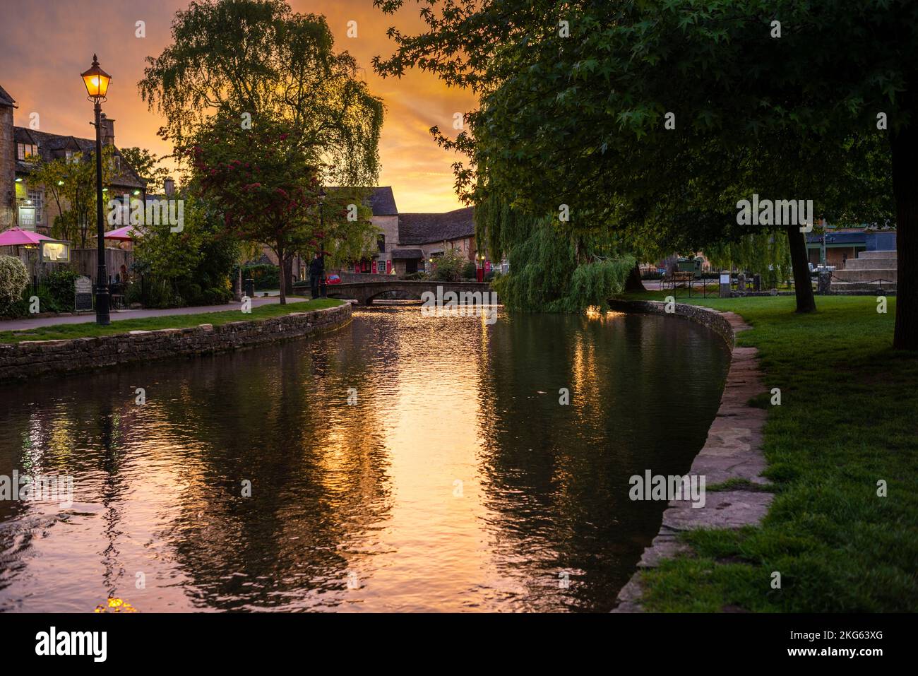 Sunset on the River Windrush in the Cotswolds, Bourton-on-the-Water, England. Stock Photo