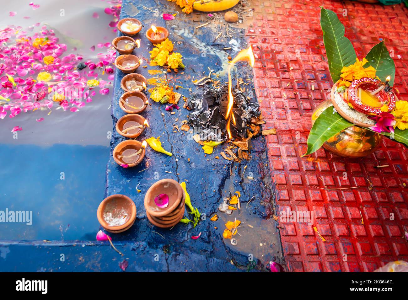 homa or havan at river shore in india for Hindu religious rituals for god during festival Stock Photo