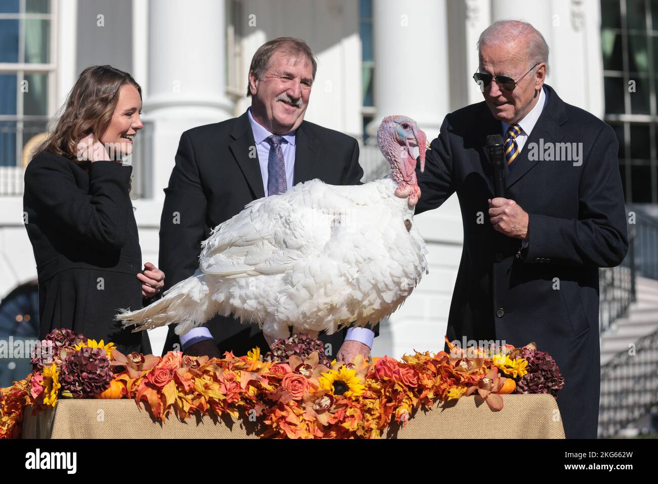 Alexa Starnes, Daughter of the Owner of Circle S Ranch and Ronald Parker,  Chairman of the National Turkey Federation join President Joe Biden as he  pardons The National Thanksgiving Turkeys on Monday, Nov. 21, 2022, on the  South Lawn of the White ...
