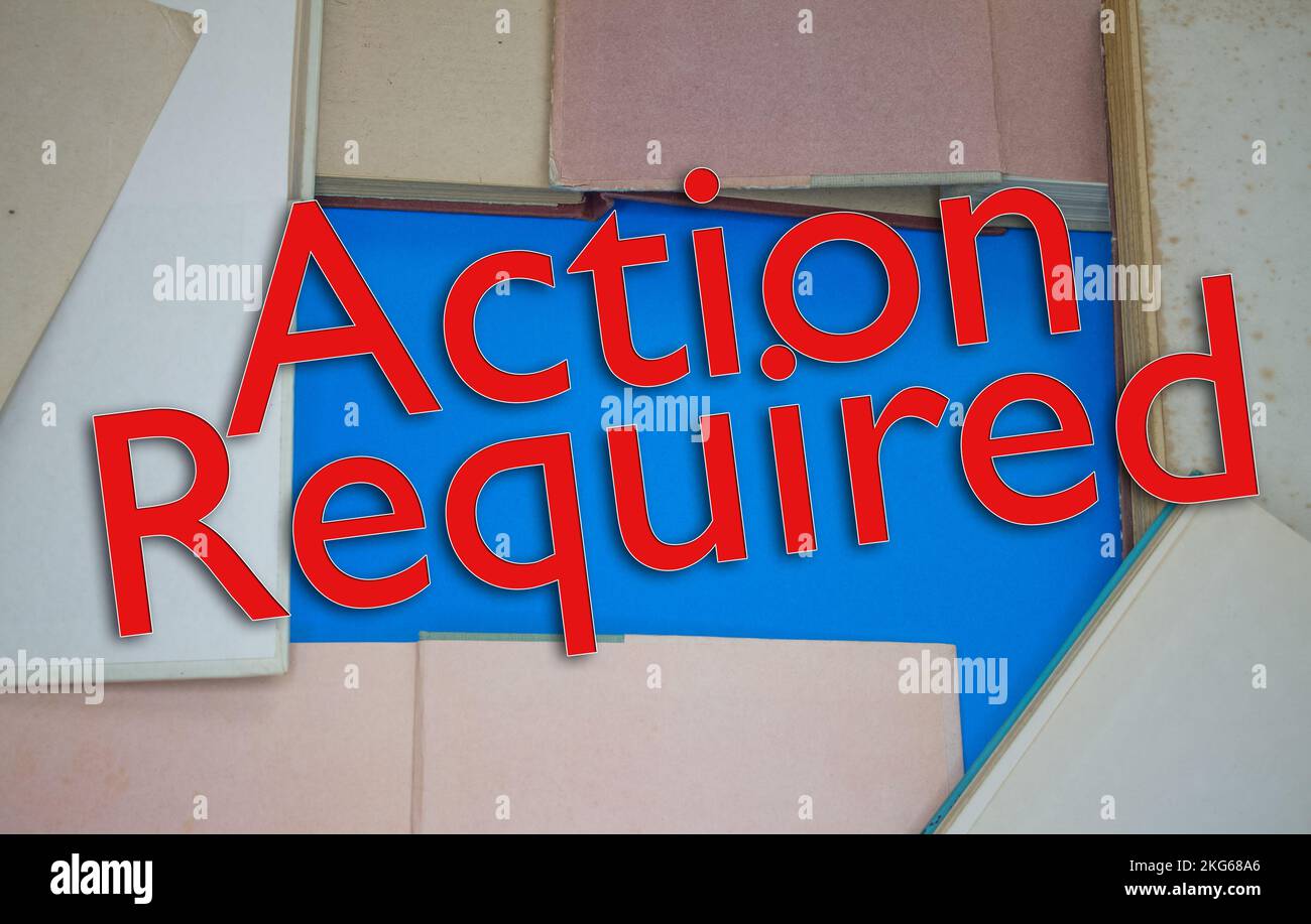 Action Required word in opened book with vintage, natural patterns old