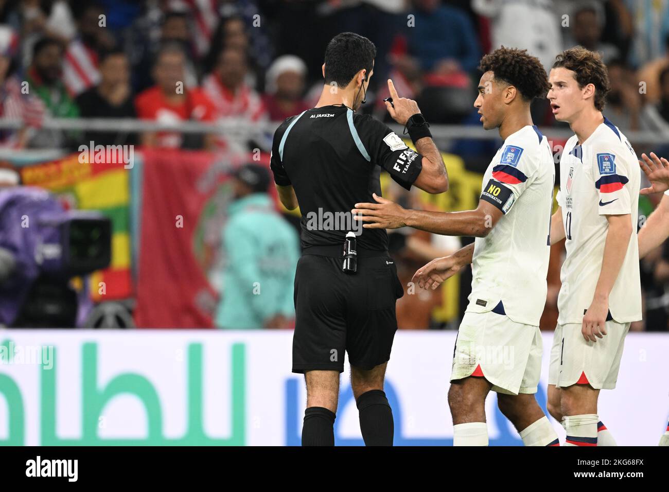 DOHA, Al Rayyan, Qatar. , . Tyler ADAMS 4, and the referee Abdulrahman Al Jassim Credit: SPP Sport Press Photo. /Alamy Live News Stock Photo