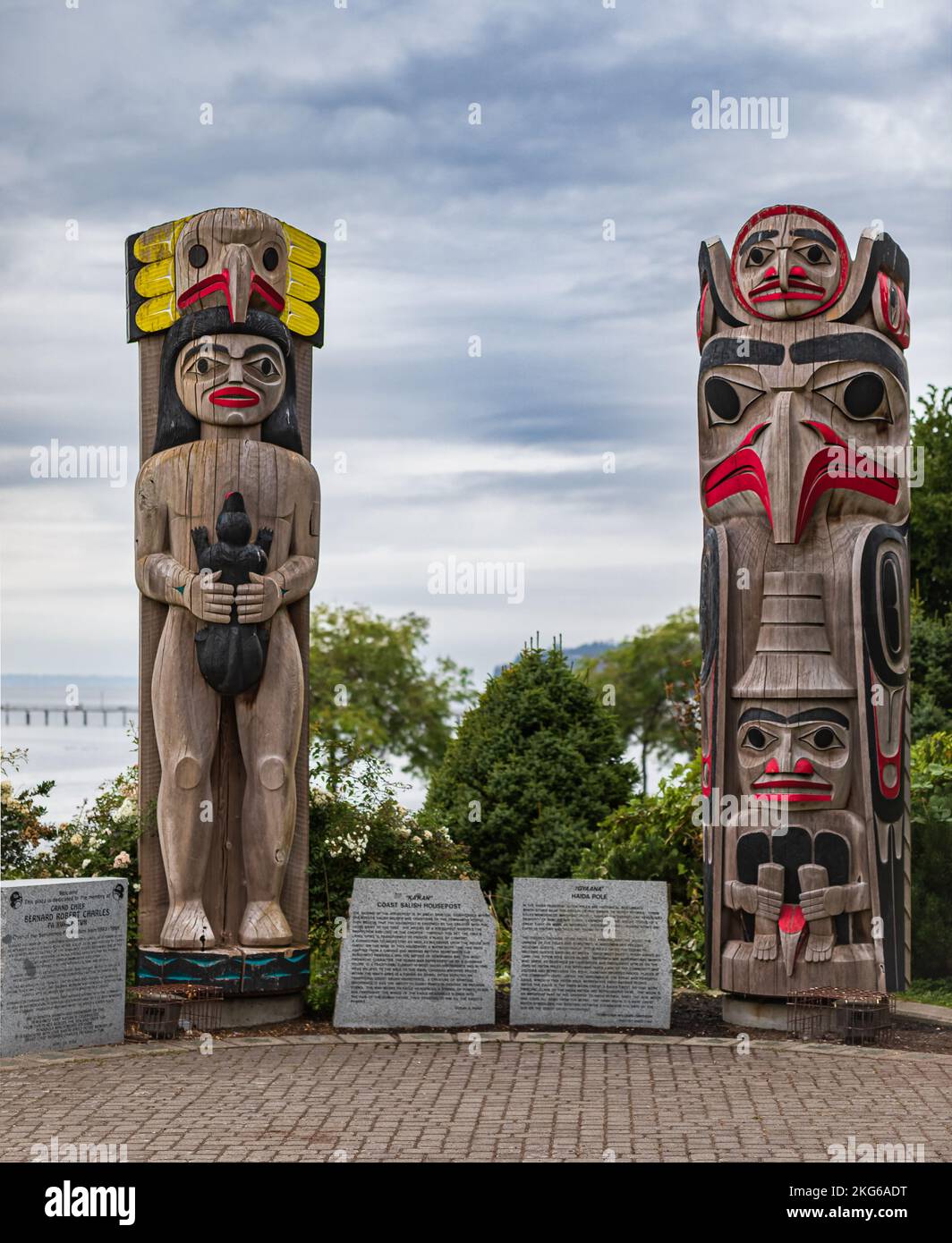 Detail of a Totem poll. Totem poles in White Rock,Vancouver, Canada. Colourful totem poles with carved birds, popular tourist attraction. Nobody, trav Stock Photo