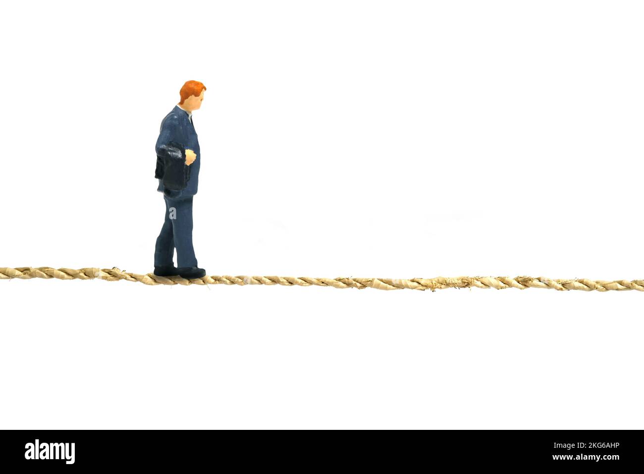 Miniature people toy figure photography. A businessman walking above ...