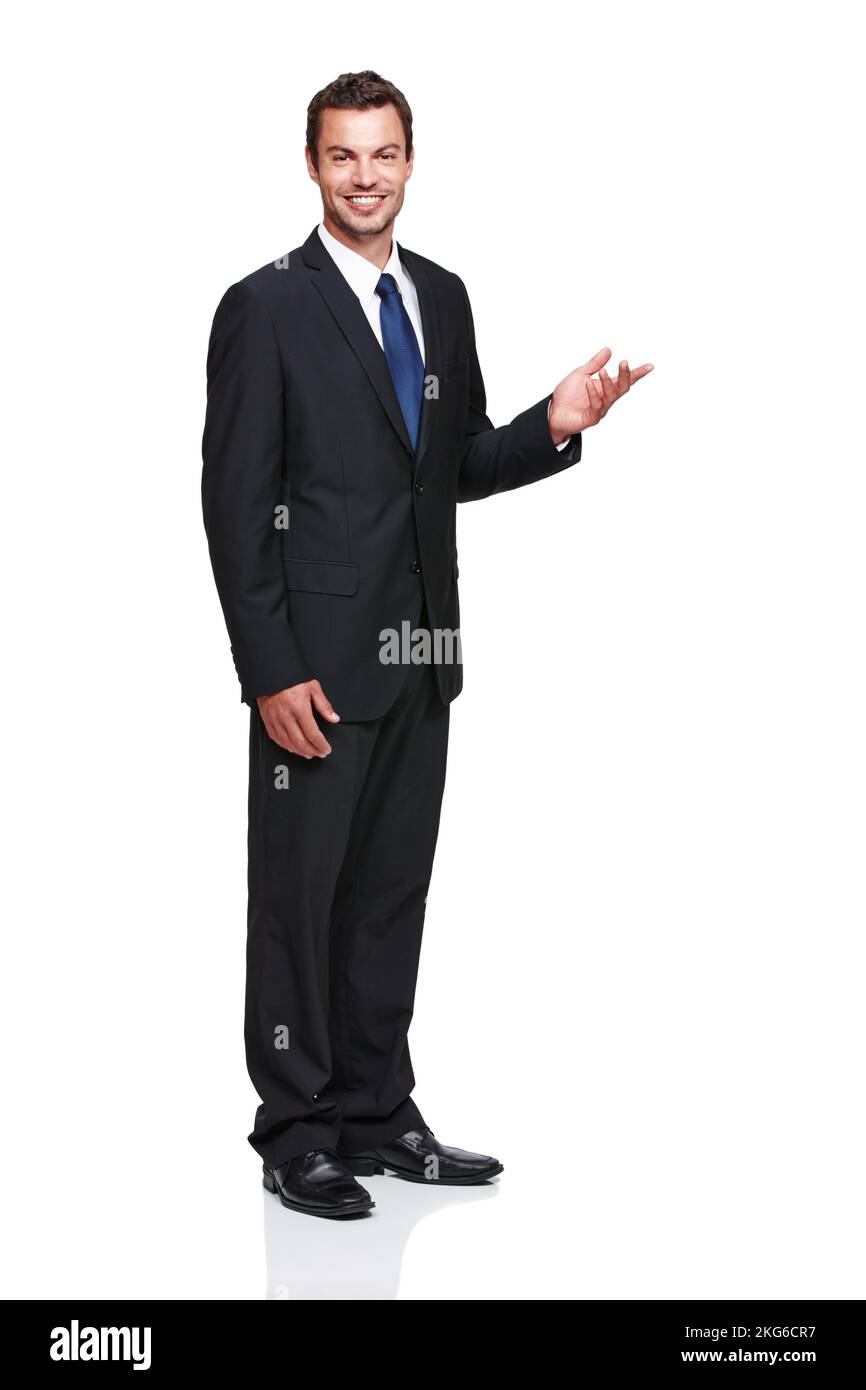 Have a look at this awesome product. Full length of a young businessman gesturing towards something while isolated on white. Stock Photo