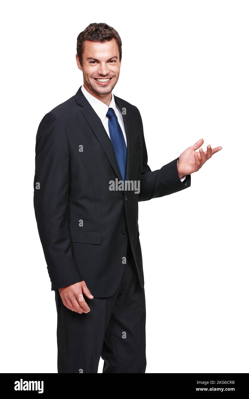Take his advice. A young businessman gesturing towards something while isolated on white. Stock Photo
