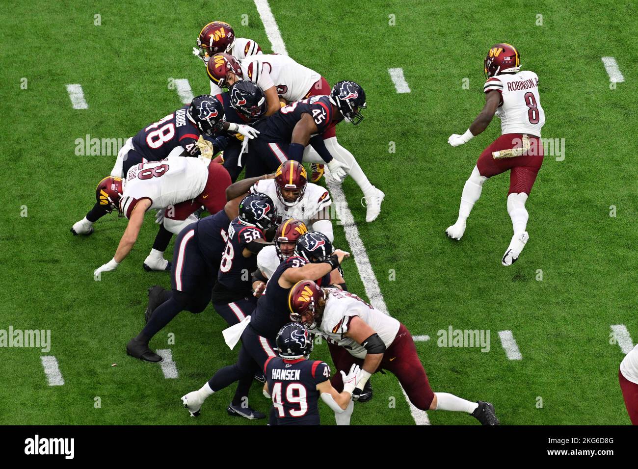 Washington Commanders running back Brian Robinson Jr. (8) runs to the